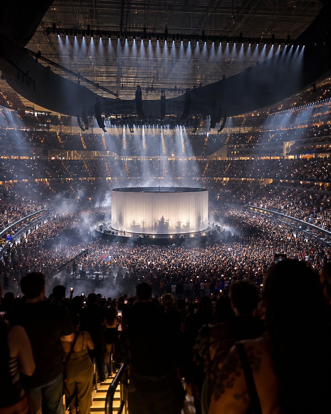 A stadium concert with a full crowd