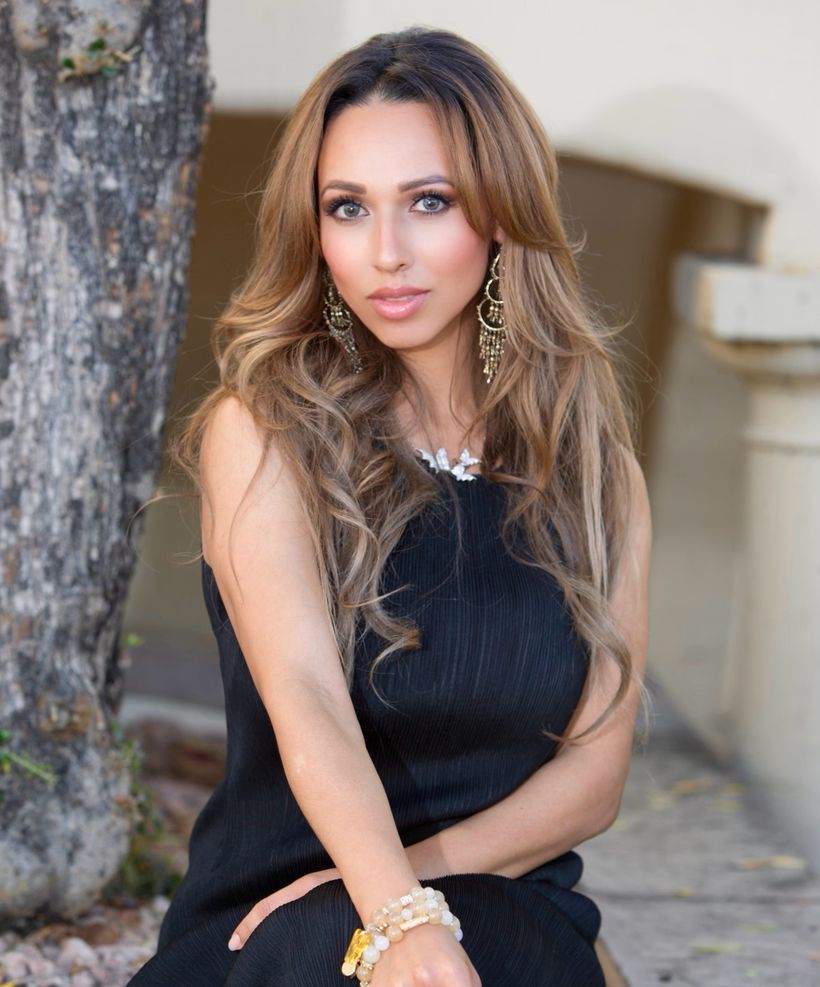 Mayra Bennett seated outdoors